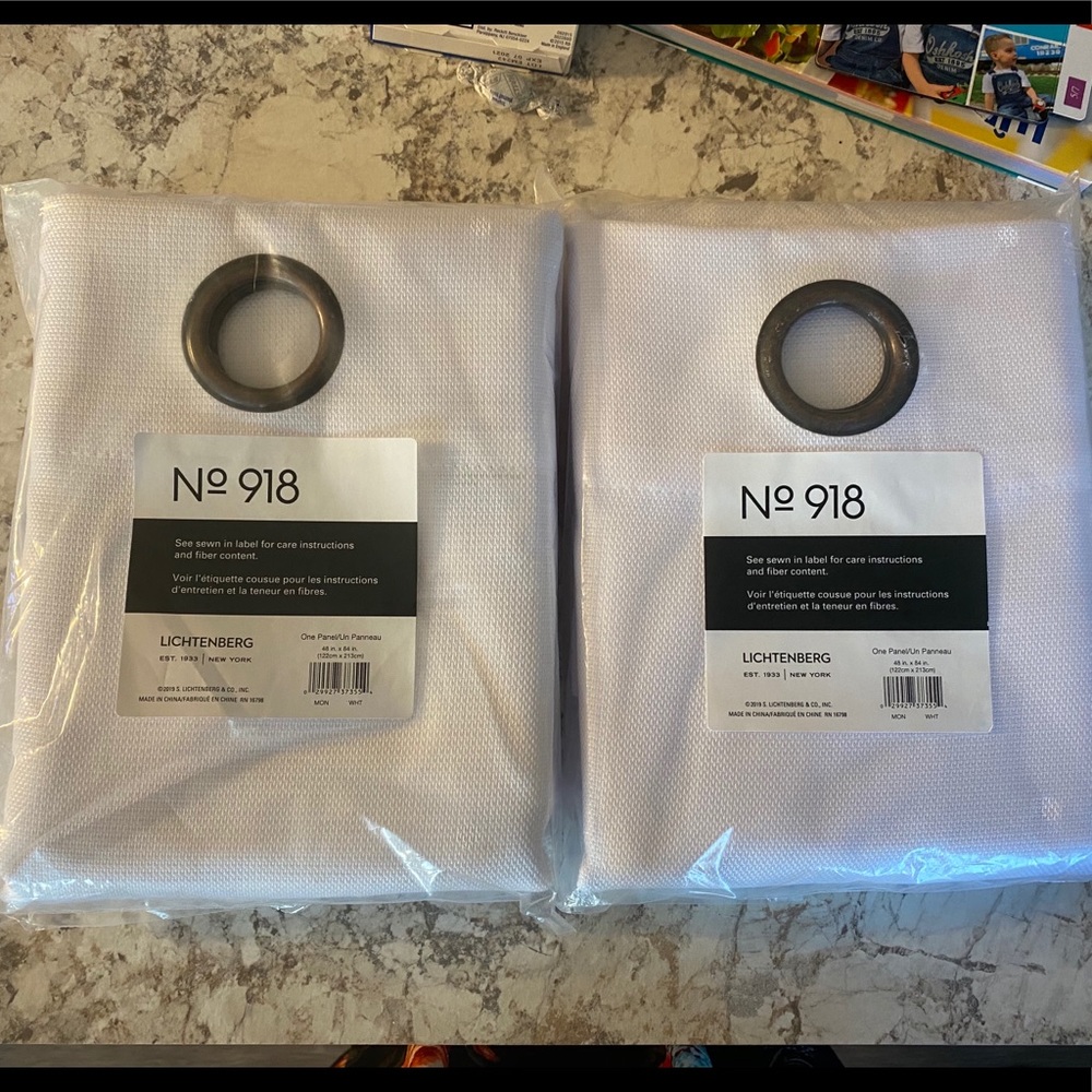 Two 48”X84” white curtain panels NWT